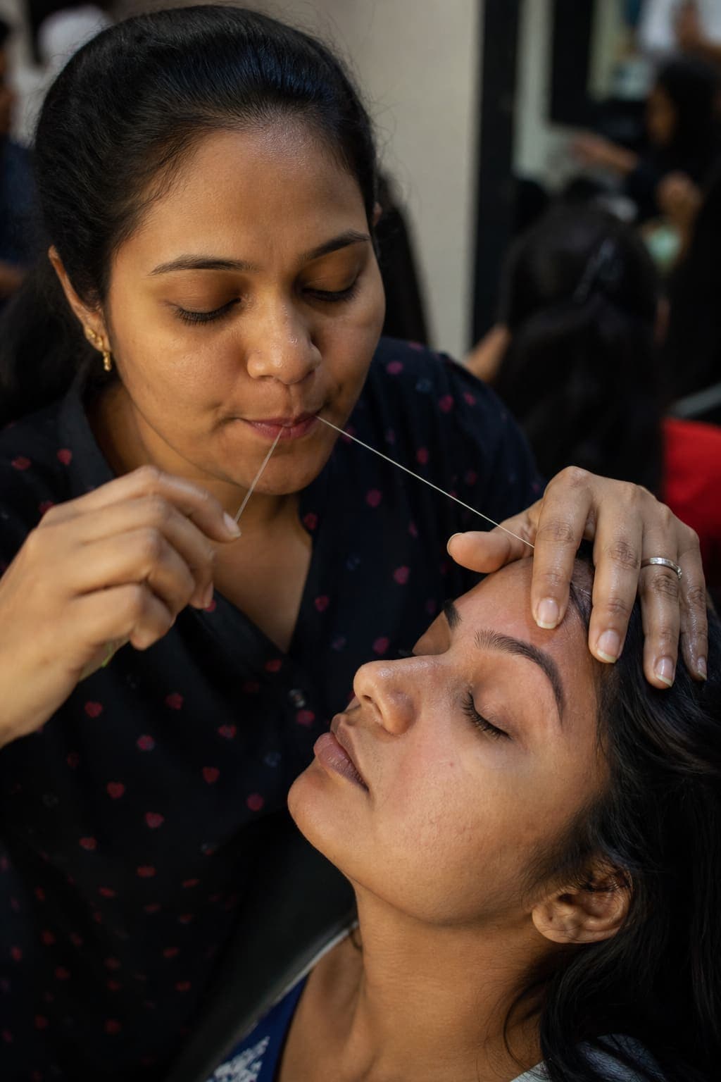 Eyebrow threading and shaping